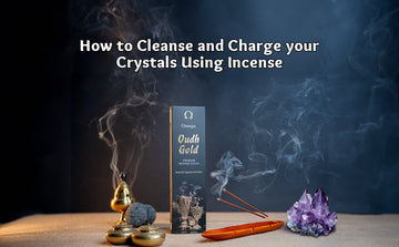 Incense sticks burning near amethyst crystal and Oudh Gold box for crystal cleansing ritual